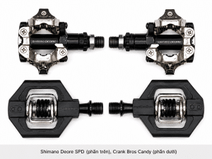Hình ảnh so sánh bàn đạp Shimano Deore SPD và Crank Bros Candy, hai hệ thống bàn đạp MTB phổ biến với cơ chế can hai mặt, phù hợp cho xe địa hình, gravel, touring và người mới làm quen với bàn đạp có can.
